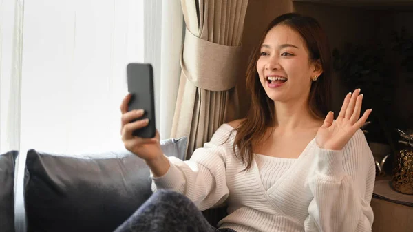 Smiling Young Woman Warm Sweater Making Video Call Chatting Online — 스톡 사진