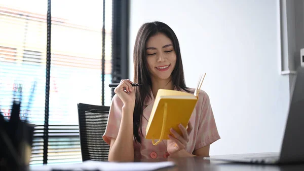 Pleasant Young Businesswoman Making Notes Agenda Plan Planning Daily Appointment — ストック写真
