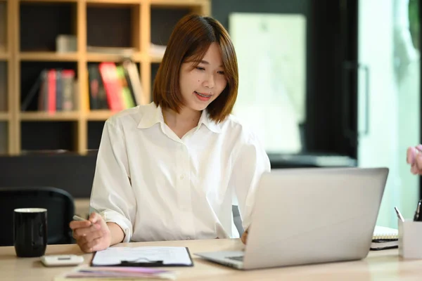 Pretty Young Female Office Worker Using Laptop Checking Financial Reports — ストック写真