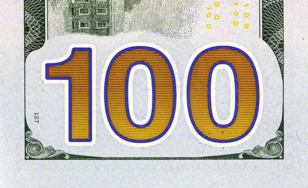 Inscription "100" on the reverse side of the banknote 100 dollars — Stock Photo, Image