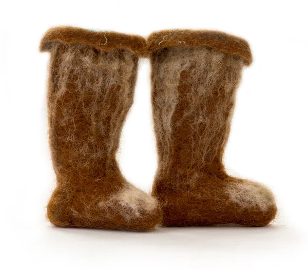 Souvenir felt boots of fulled wool on a white background — Stock Photo, Image
