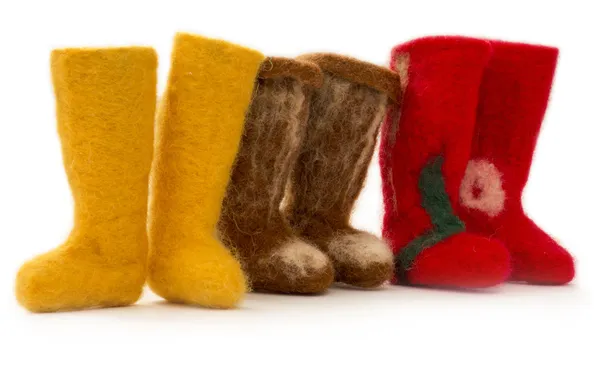 Souvenir felt boots of fulled wool on a white background — Stock Photo, Image