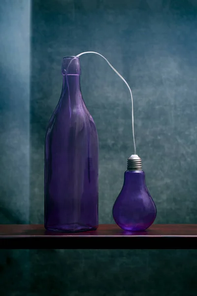 Still Life Purple Bottle Light Bulb Stylization — Photo