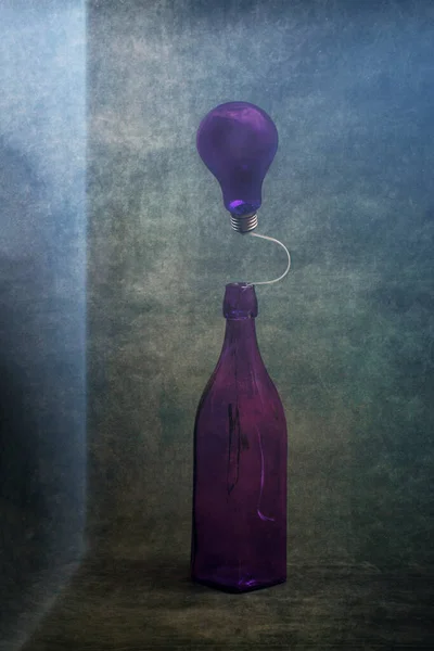Still Life Purple Bottle Light Bulb Stylization — Photo