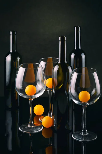 Still Life Bottles Glasses Orange Balls — ストック写真