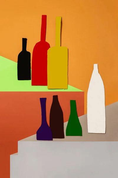 Decorative Still Life Cut Out Cardboard Bottles Colored Background — Stockfoto