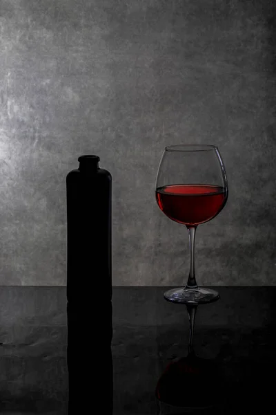 Still Life Wine Glasses Bottle Reflective Surface — Stock fotografie