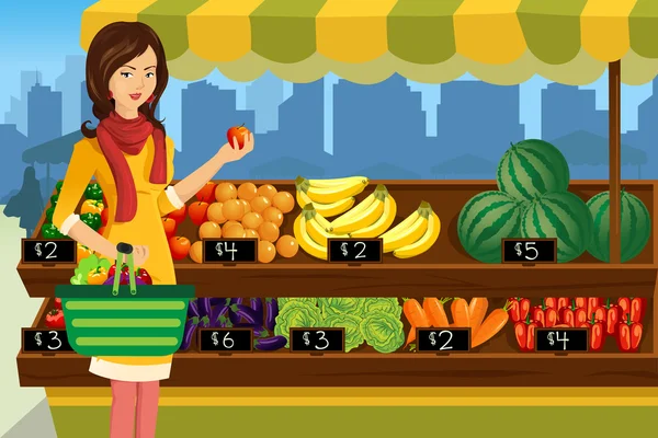 Woman shopping in an outdoor farmers market — Stock Vector