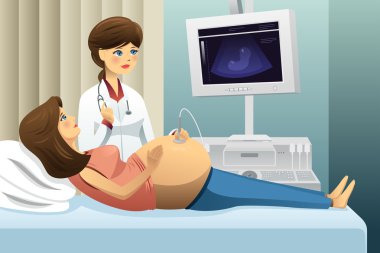 Pregnant woman getting an ultrasound clipart