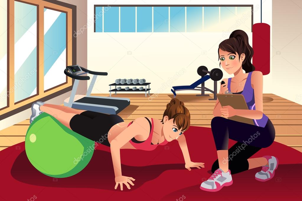 Female personal trainer training a woman in the gym