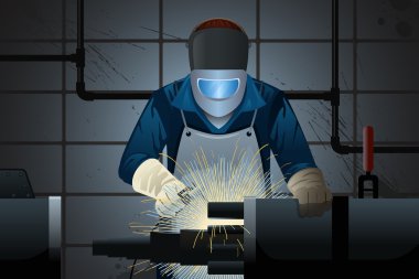 bir makine üzerinde çalışan kaynak makinesi