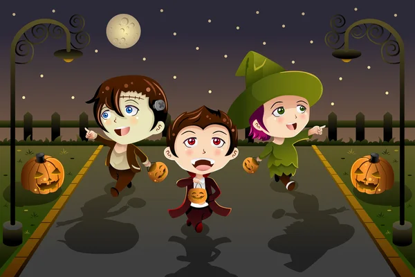 Niños con disfraces de Halloween — Vector de stock