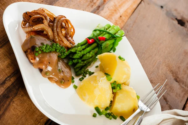 Steak and potatoes — Stockfoto