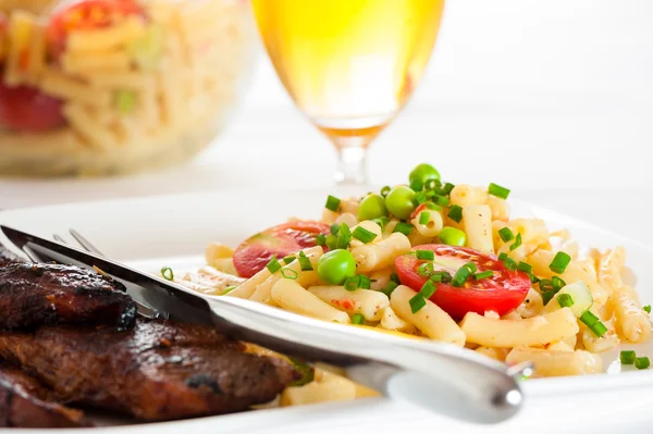 Steak and pasta — Stock Photo, Image