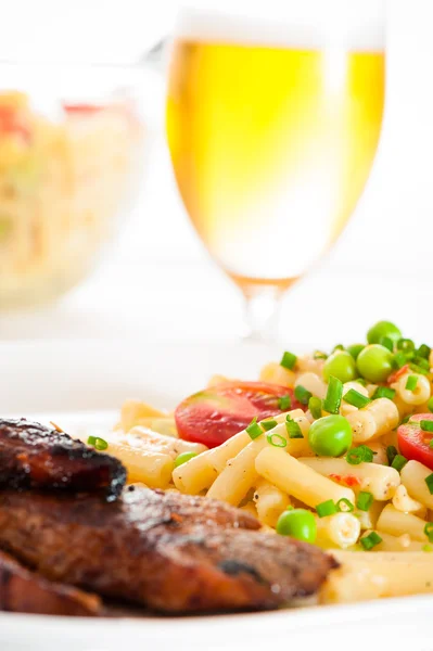 Steak and pasta — Stock Photo, Image