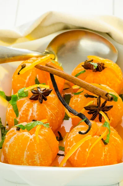 Mandarins in spiced syrup — Stock Photo, Image