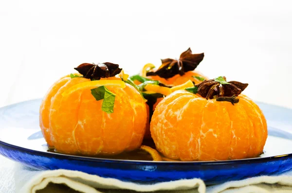 Mandarins in spiced syrup — Stock Photo, Image