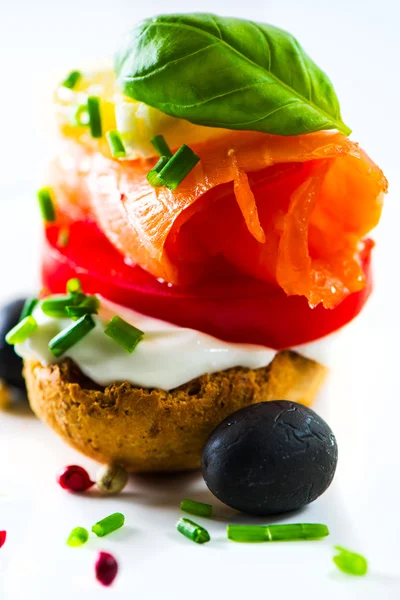 Canapes with smoked salmon — Stock Photo, Image