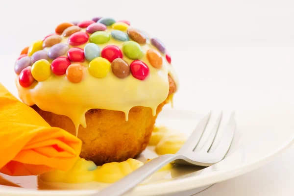 Cupcake and smarties — Stock Photo, Image