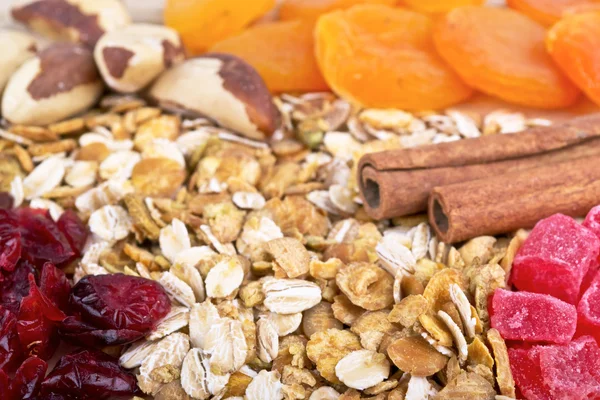 Muesli Granola oat flakes on wood board — Stok Foto