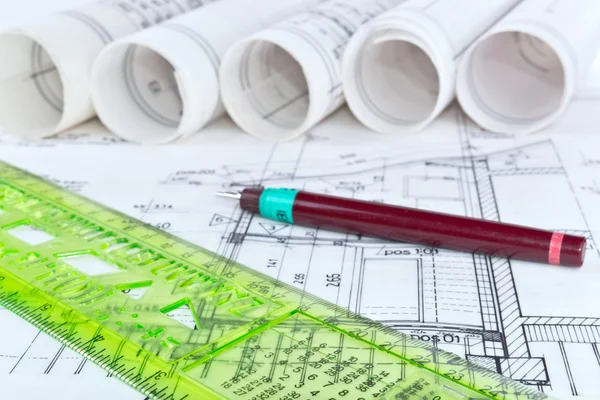 Architect blueprints and rolls background — Stock Photo, Image