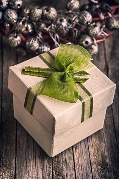 Gift box on wood — Stock Photo, Image