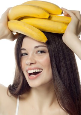 muz ile gülümseyen kadın