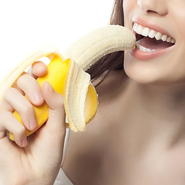 Lachende vrouw met bananen — Stockfoto