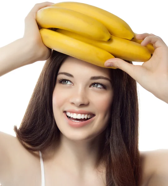 Lachende vrouw met bananen — Stockfoto