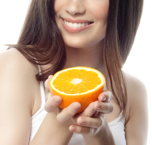 Smiling woman with orange — Stock Photo, Image