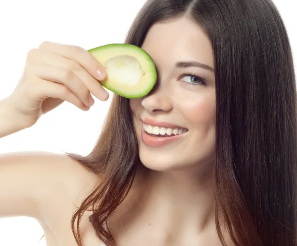 Smiling woman with with avocado — Stock Photo, Image