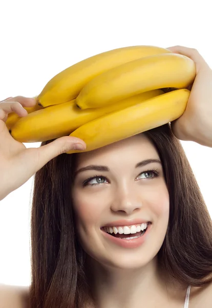 Lachende vrouw met bananen — Stockfoto