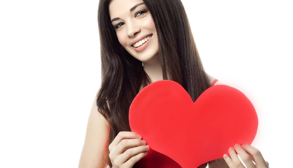Woman with heart shaped paper Stock Photo