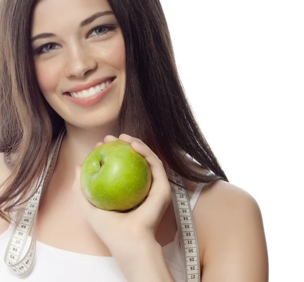 Vrouw met apple en meting — Stockfoto