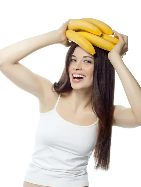 Lachende vrouw met bananen — Stockfoto