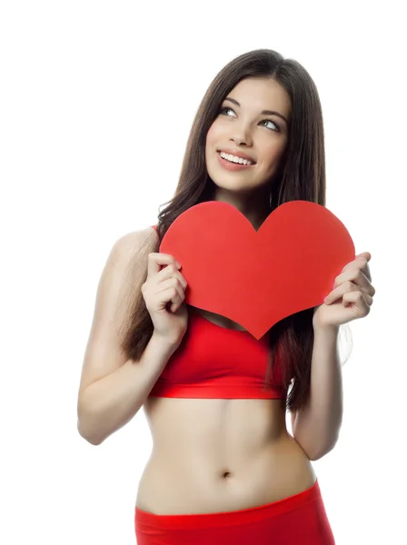 Woman with heart shaped paper — Stock Photo, Image