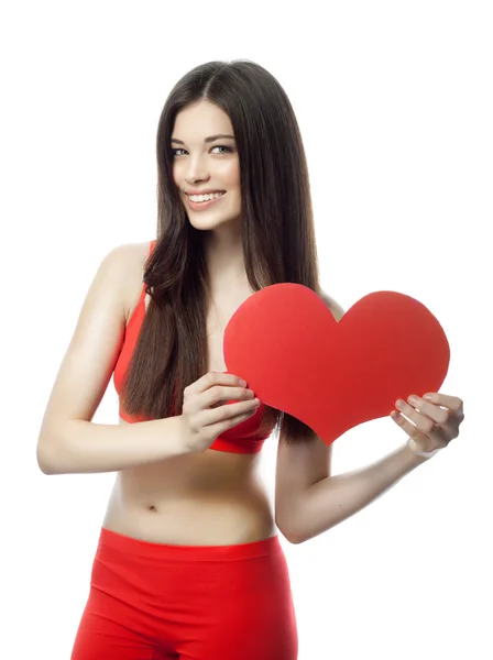 Woman with heart shaped paper — Stock Photo, Image