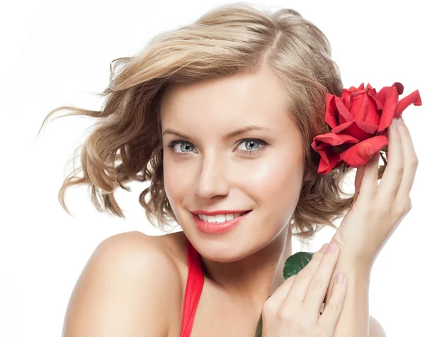 Woman in red dress with rose — Stock Photo, Image