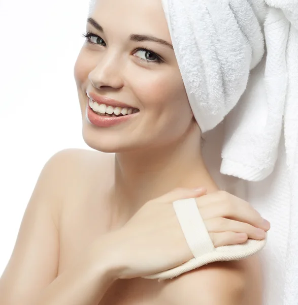 Smiling woman with towel on head — Stock Photo, Image