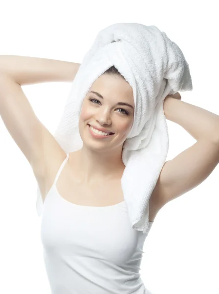 Smiling woman with towel on head — Stock Photo, Image