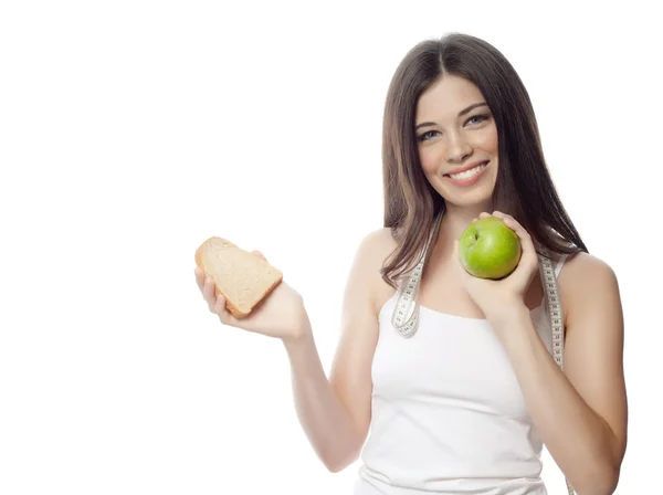 Woman with apple and measurement — Stock Photo, Image