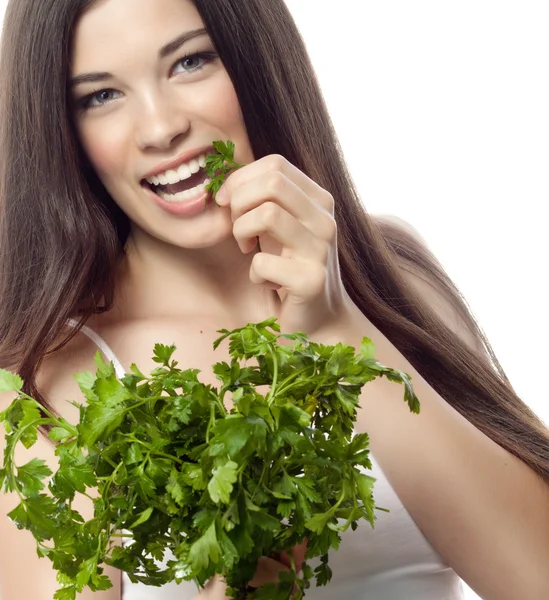 Mujer sonriente con perejil — Foto de Stock