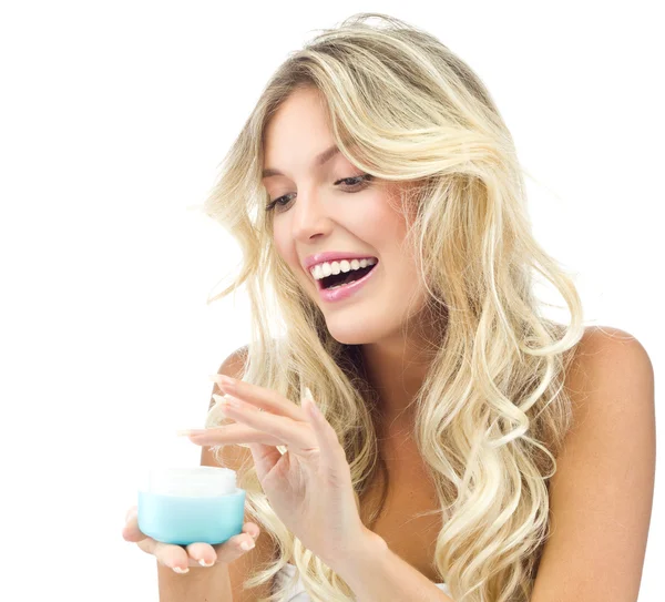 Smiling woman with cream — Stock Photo, Image