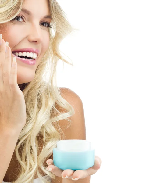 Smiling woman with cream — Stock Photo, Image