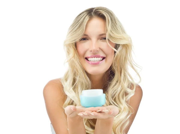 Smiling woman with cream — Stock Photo, Image