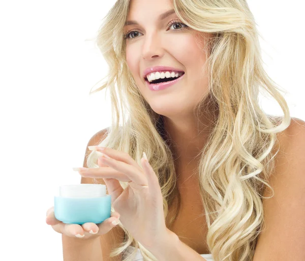 Mujer sonriente con crema — Foto de Stock