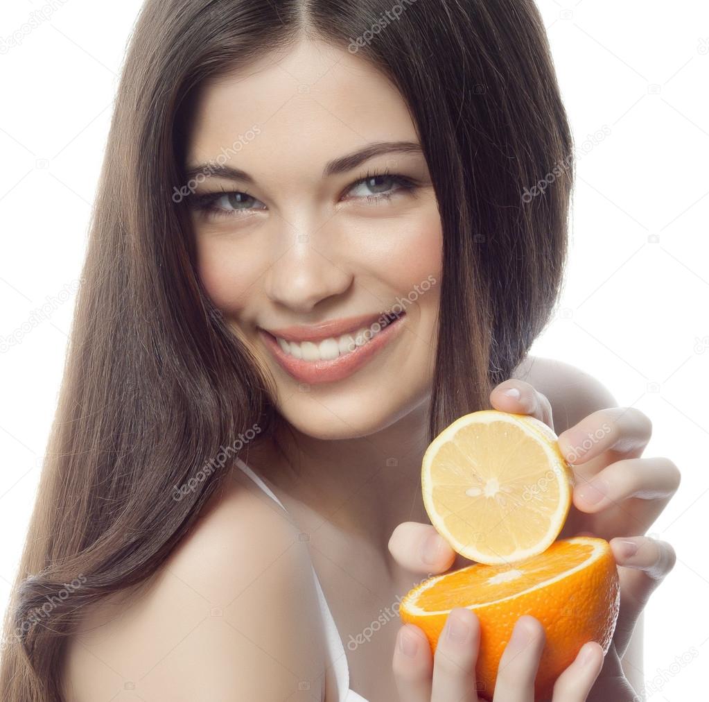 Smiling woman with orange