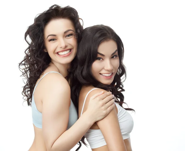 Two attractive smiling women — Stock Photo, Image