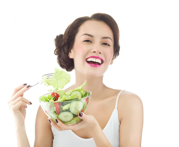 Mulher está comendo salat — Fotografia de Stock