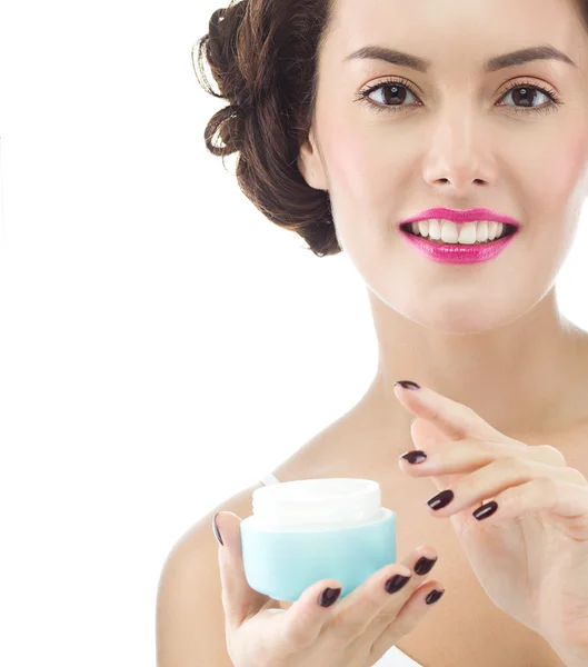 Woman is applying cream — Stock Photo, Image